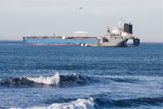 The oil tanker "Grinch", suspected of belonging to the Russian's shadow fleet, is seen outside the coast of Martigues near the port of Marseille-Fos on January 25, 2026, as it's surveilled by the French Navy
