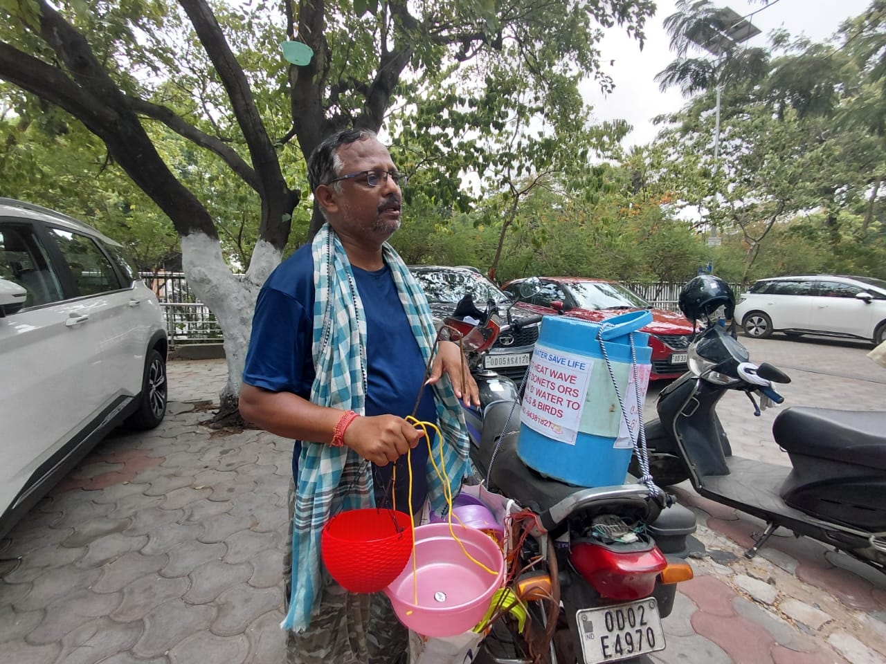 Angels in the Heat: How The Birdmen Of Odisha Provision Water For Thirsty Birds And Animals