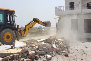 BULLDOZER ACTION ON DRUG SMUGGLER