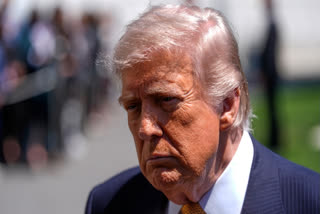 President Donald Trump speaks to reporters as he leaves the White House for travel to Beijing, Tuesday, May 12, 2026, in Washington, to meet with China's President Xi Jinping.