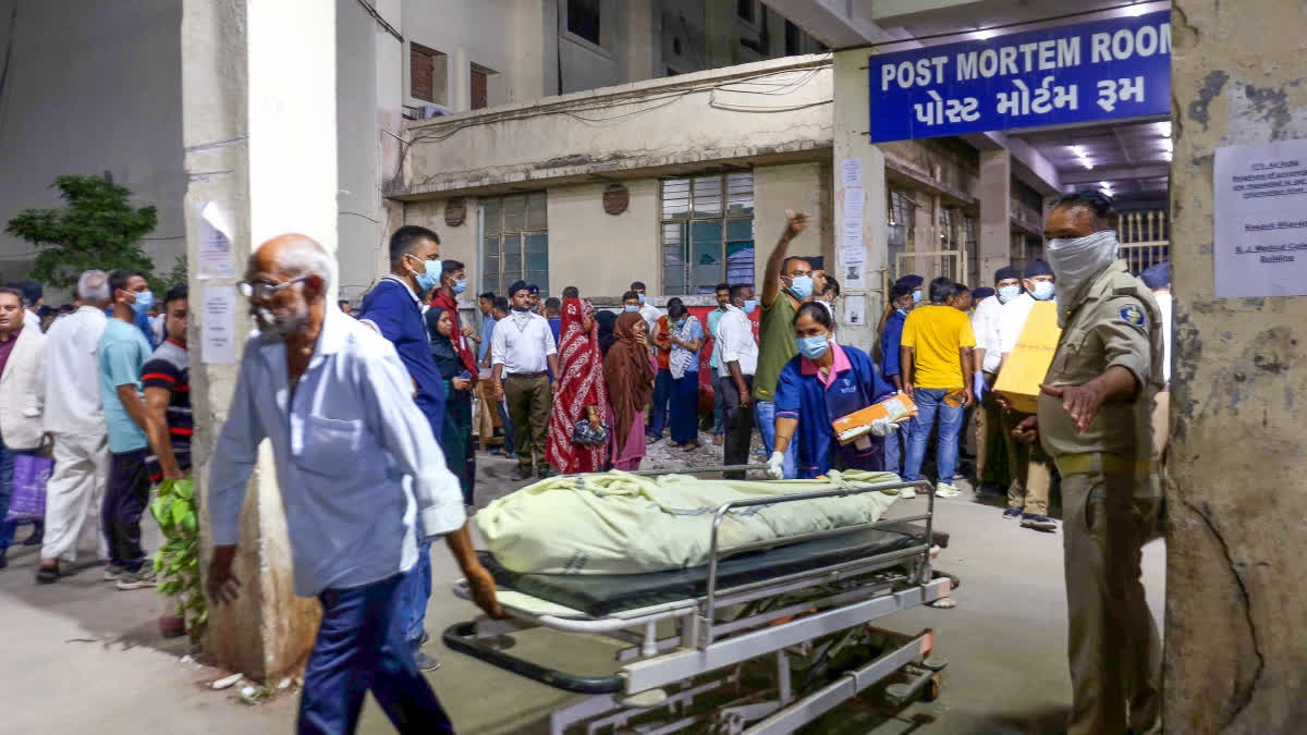 Bodies Of Six Air India Crash Victims Handed Over To Relatives, Say Police Health workers bring a victim on a stretcher to Civil Hospital after the crash of Air India flight AI171 in Ahmedabad on Thursday, June 12, 2025.