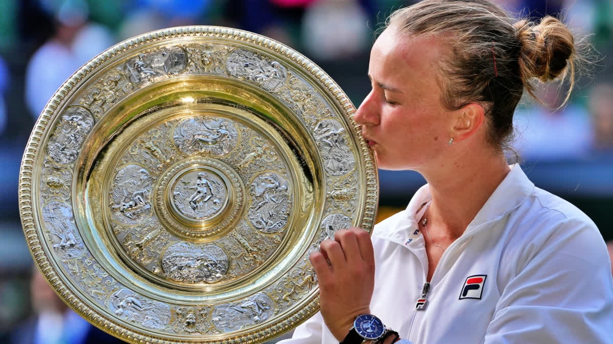 Barbora Krejcikova Wins Wimbledon For Her Second Grand Slam Trophy By Beating Jasmine Paolini Barbora Krejcikova of the Czech Republic kisses her trophy after defeating Jasmine Paolini of Italy in the women's singles final at the Wimbledon tennis championships in London, Saturday, July 13, 2024.