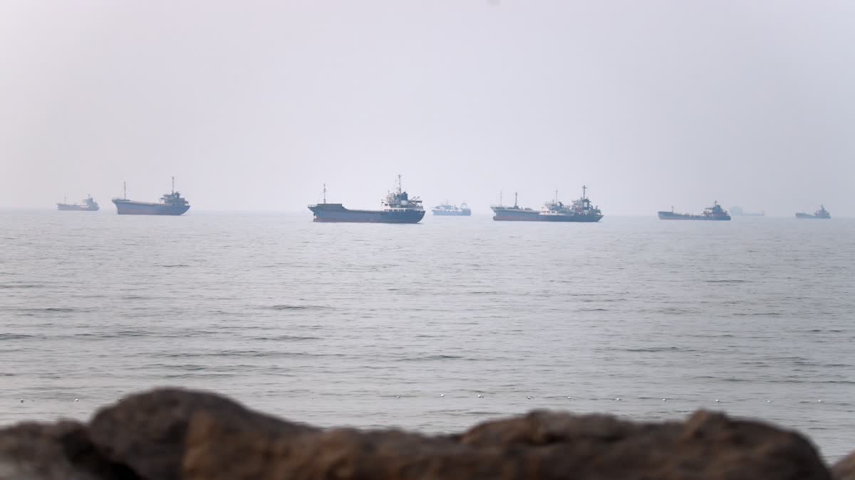 Commercial vessels are seen in the Strait of Hormuz off Bandar Abbas, Iran, Tuesday, June 30