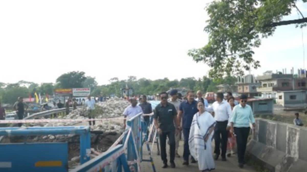 CM Mamata Banerjee inspects a flood-hit area in North Bengal on Monday.