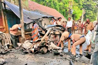 File photo of police personnel collecting evidence from the site of car bomb blast in Coimbatore