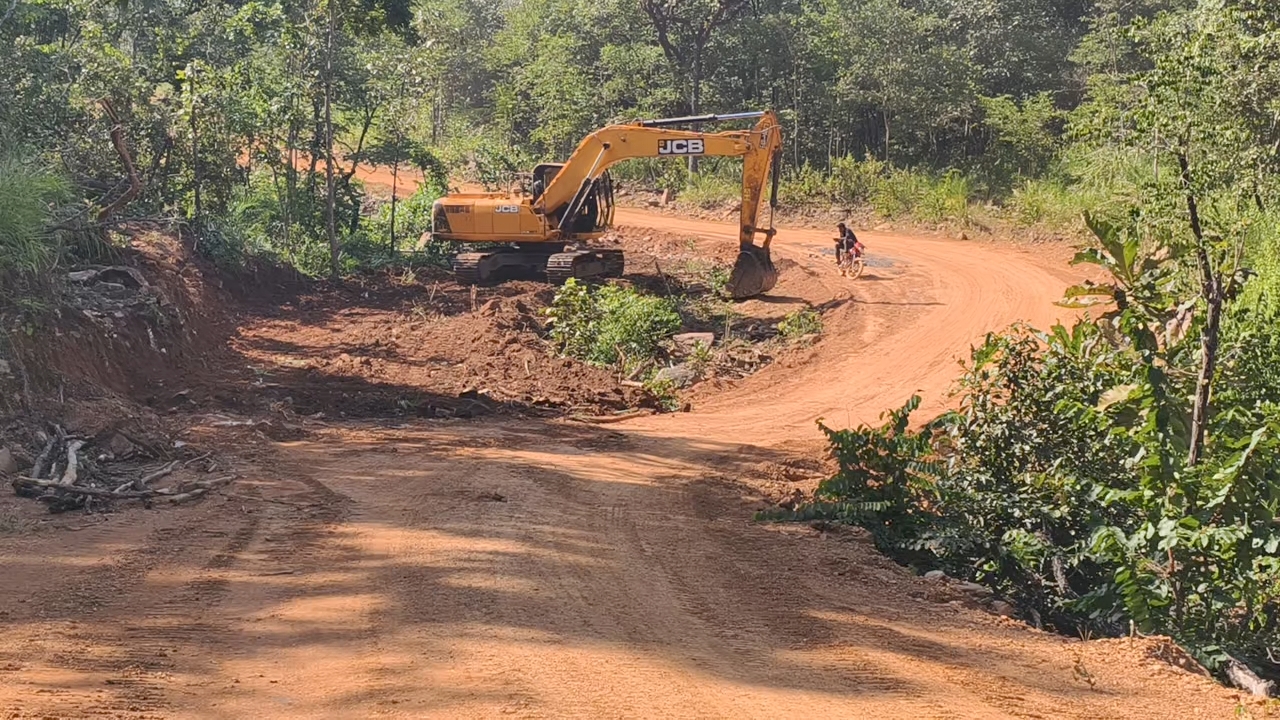 A JCB engaged in a road widening project in Toke village.