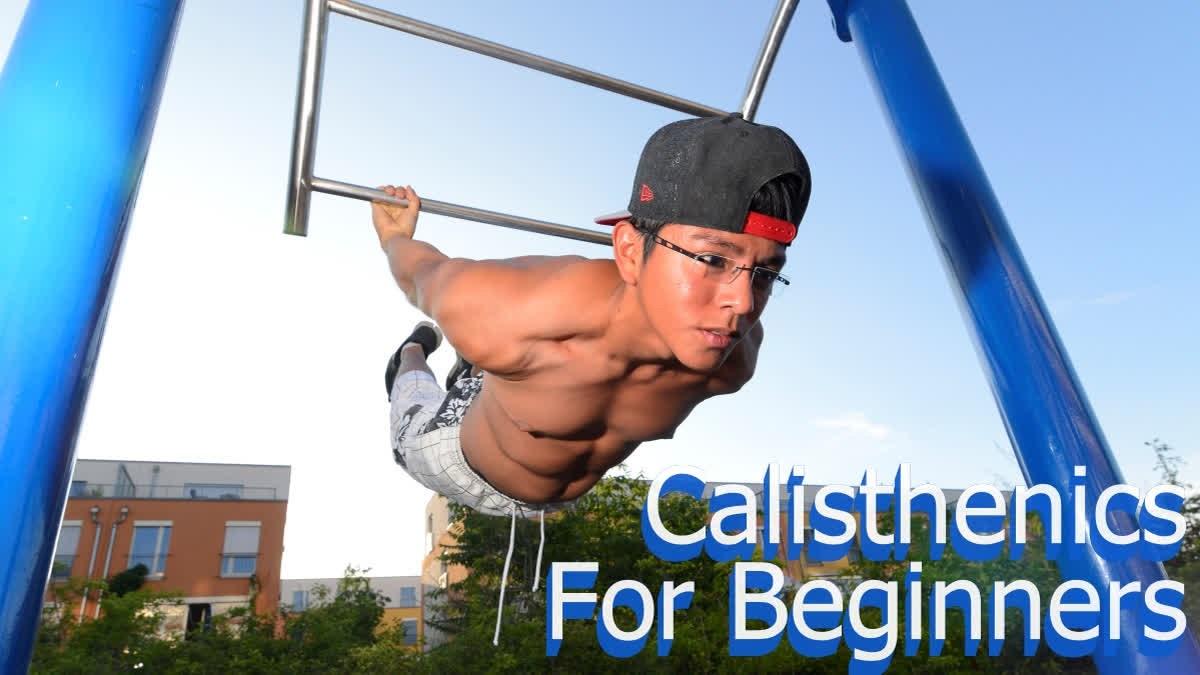 Boy doing calisthenics in the park