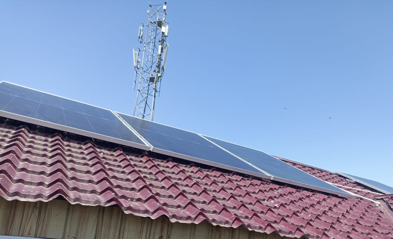 Solar panels mounted on a rooftop of a house in Kashmir