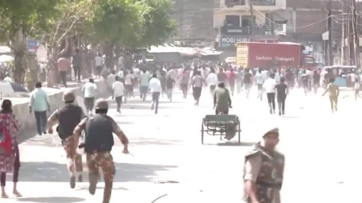 Workers protest in Noida, with stone-pelting reported during the agitation over a wage increase.