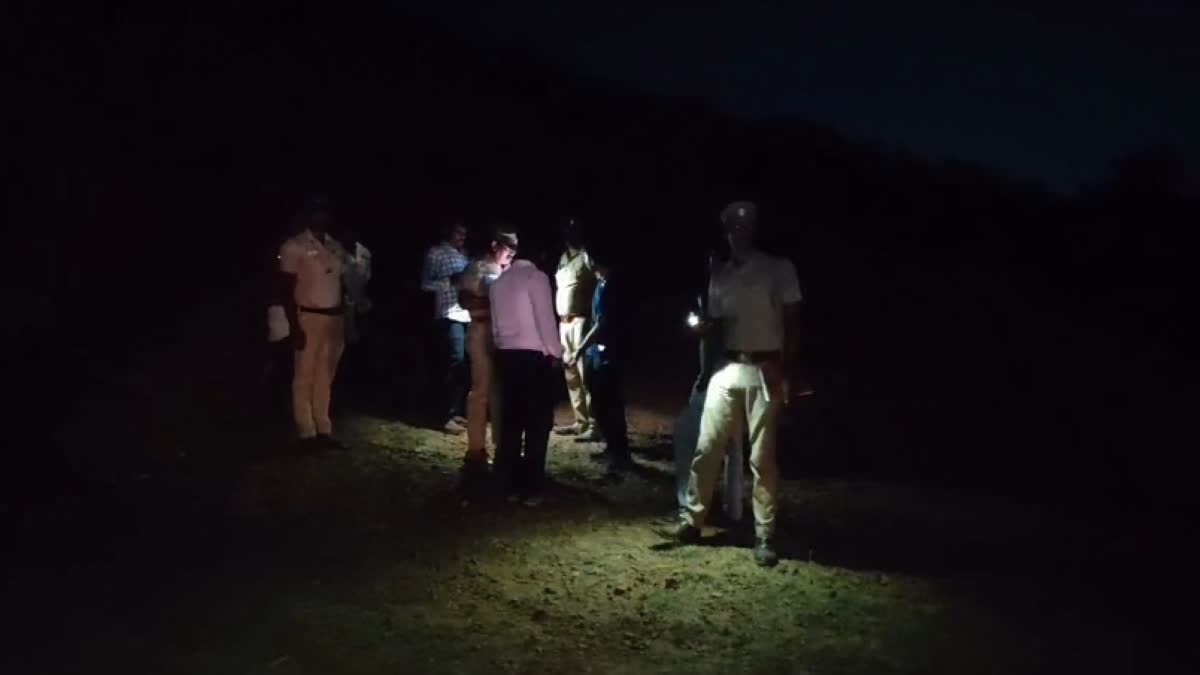 Investigtors examine the spot where an unexploded device detonated killing an engineering student in Chengalpattu