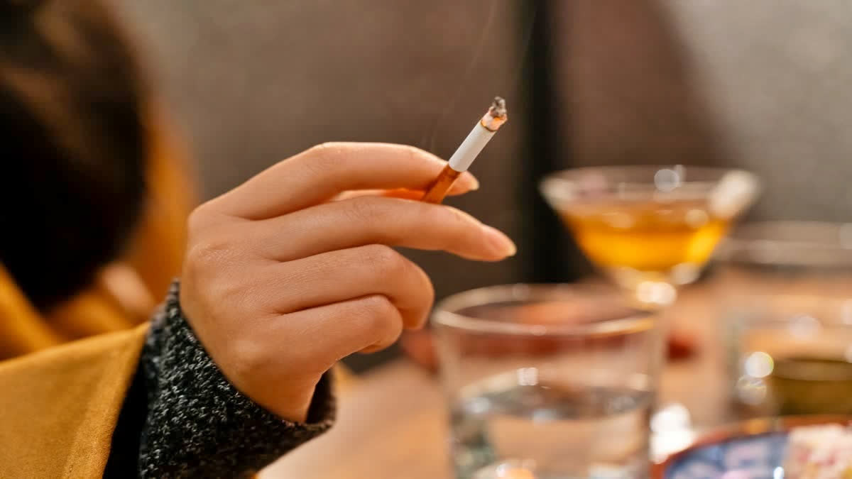 Smoking May Worsen Chronic Pain Even As Patients Turn To It for Relief, Researchers Warn Smoking at a dinner table