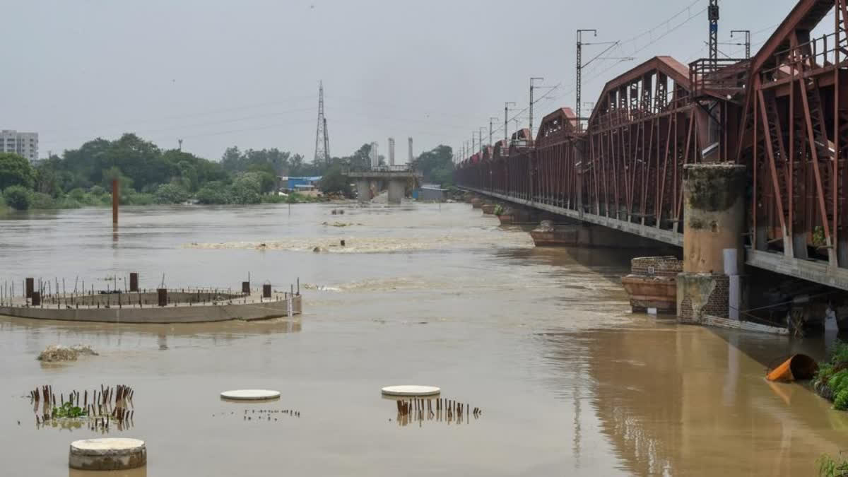 The Yamuna River flows through low-lying areas of Delhi.