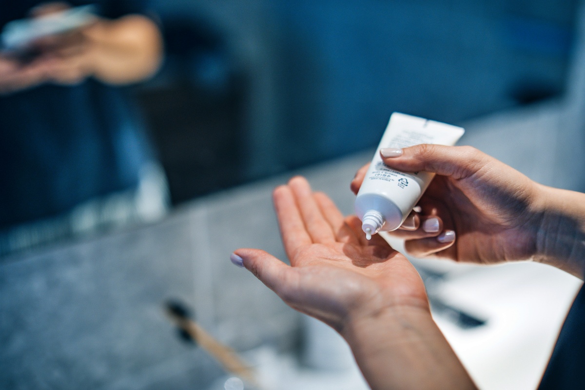 Woman using a cream