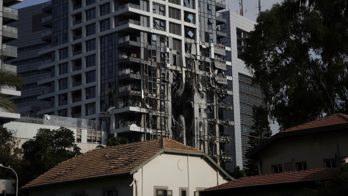 A residential building that was struck by a missile fired from Iran, is seen in Tel Aviv, Israel on Saturday, June 14, 2025.