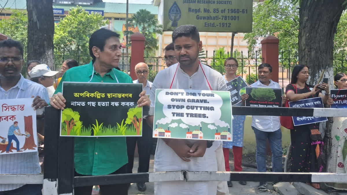 PROTESTS AGAINST CUTTING OF TREES AT Dighalipukhuri