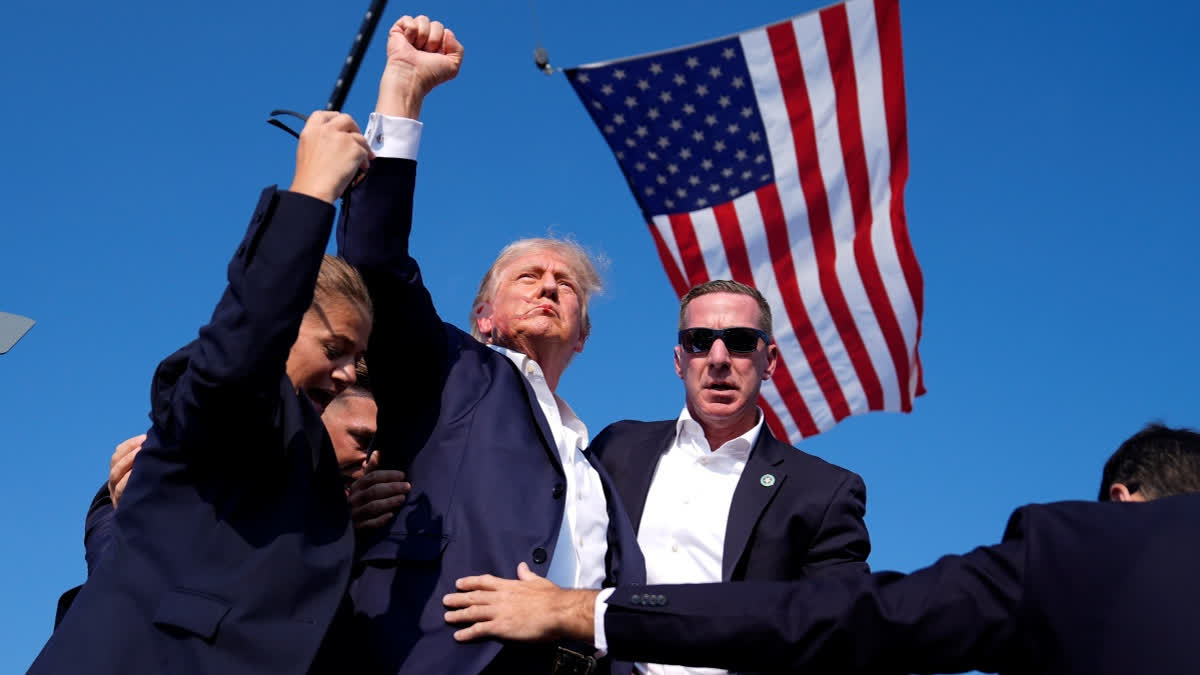 'God Alone Prevented The Unthinkable...': In First Statement After Attack, Donald Trump Calls For Unity Republican presidential candidate former President Donald Trump is surround by U.S. Secret Service agents at a campaign rally, Saturday, July 13, 2024, in Butler, Pa.