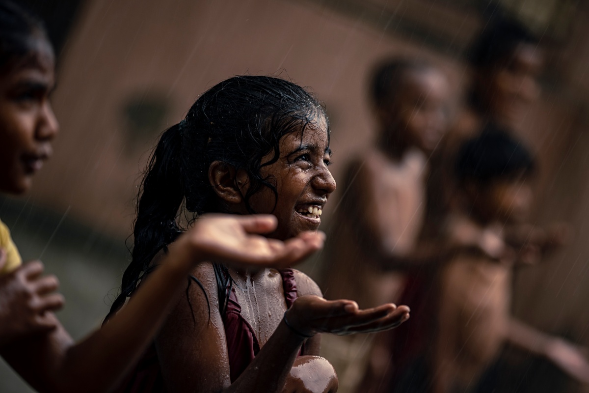 Children enjoying the rain