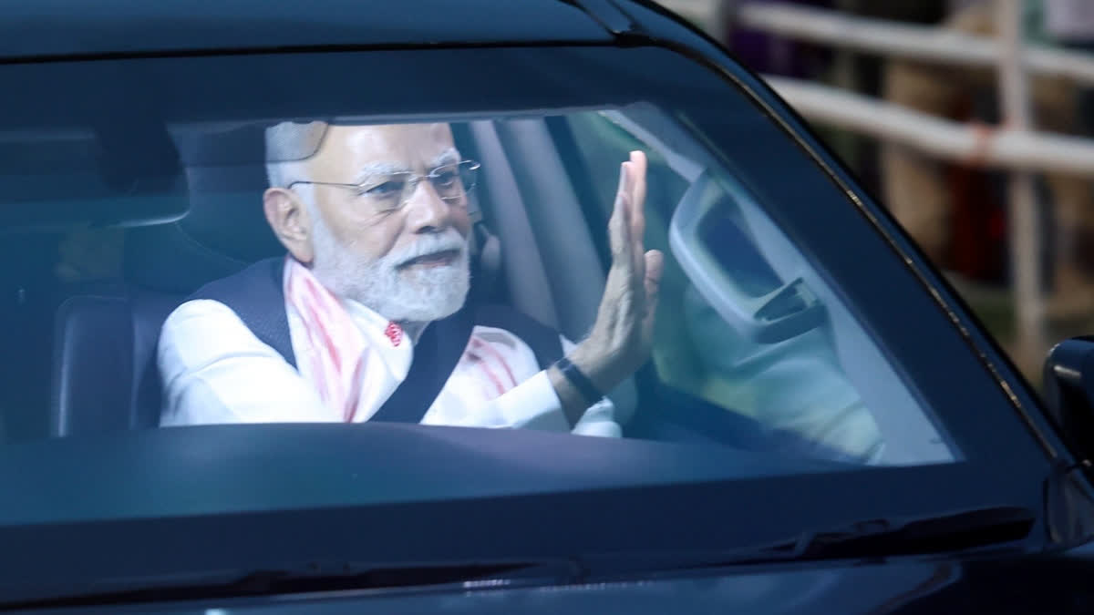 PM Modi Greets People On Hindi Diwas Prime Minister Narendra Modi receives a warm welcome from the crowd during the Grand Road Show in Guwahati, Assam, on Saturday, September 13, 2025.