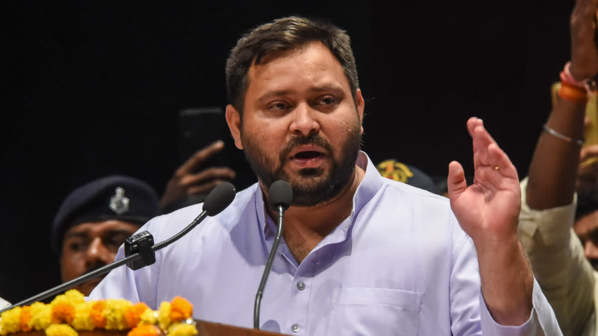 RJD leader Tejashwi Yadav addresses the Doctors Samvad at Bapu Sabhagar in Patna on Sunday.