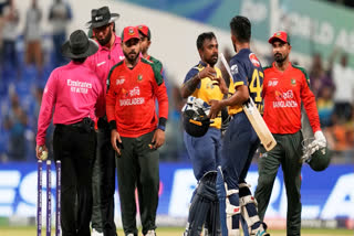Sri Lanka Crush Bangladesh By Six Wickets To Record Commanding Win In Asia Cup Sri Lanka's captain Charith Asalanka, third right, and teammate Kamil Mishara celebrate after winning the Asia Cup cricket match against Bangladesh at Zayed Cricket Stadium in Abu Dhabi, United Arab Emirates, Saturday, Sept. 13, 2025.