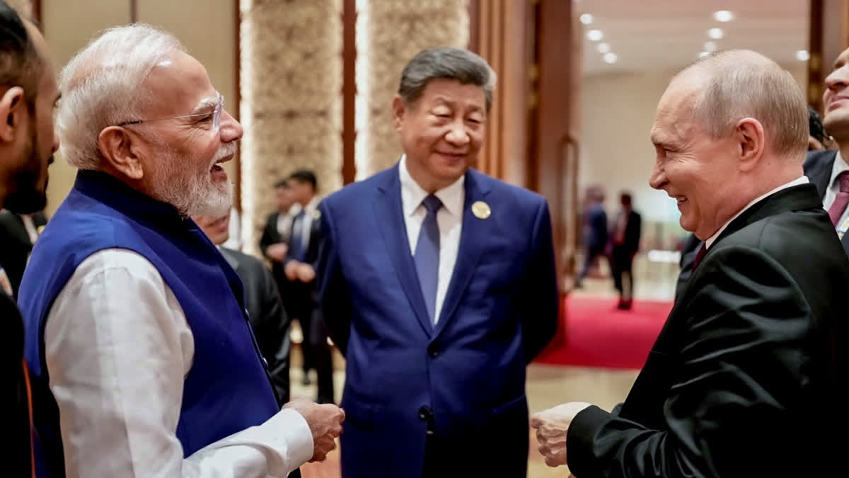 Prime Minister Narendra Modi with Russian President Vladimir Putin and Chinese President Xi Jinping on the sidelines of the 18th BRICS Summit, in New Delhi.