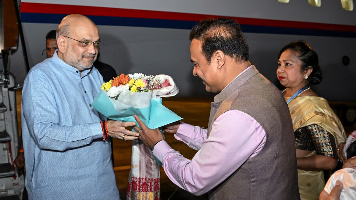 In this image via Assam CMO on March 14, 2025, Union Minister for Home Affairs and Cooperation Amit Shah is being received by Assam Chief Minister Himanta Biswa Sarma upon his arrival in Jorhat, Friday, March 14, 2025.