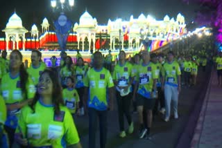 Enthusiastic runners participate in India's first of its kind Cine Magical Glow Run at Ramoji Film City in Hyderabad