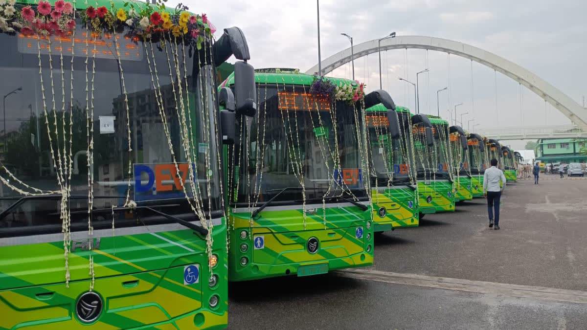 The electric bus fleet at a DTC depot.