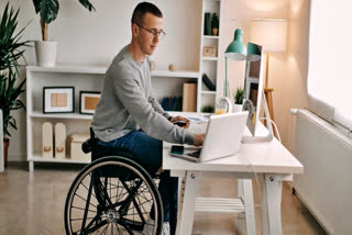 PwD using a laptop