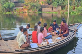 Mohammad Sahab teaches on the boat.