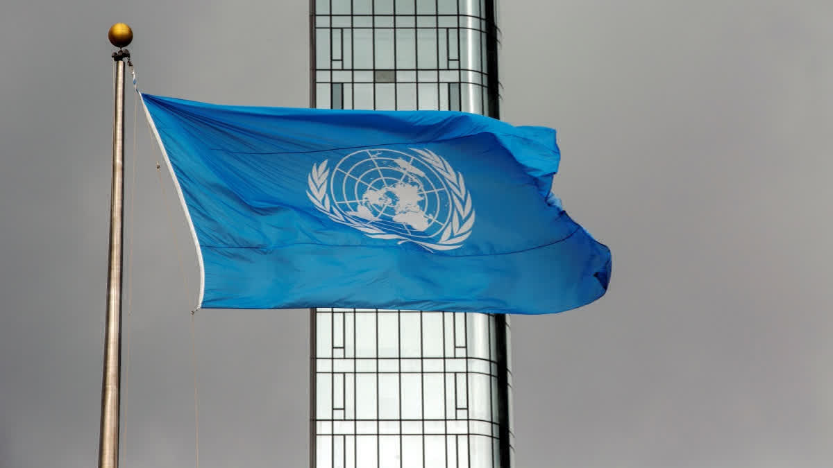 FILE - The UN flag flies on a stormy day at the United Nations during the United Nations General Assembly, Sept. 22, 2022. (AP)