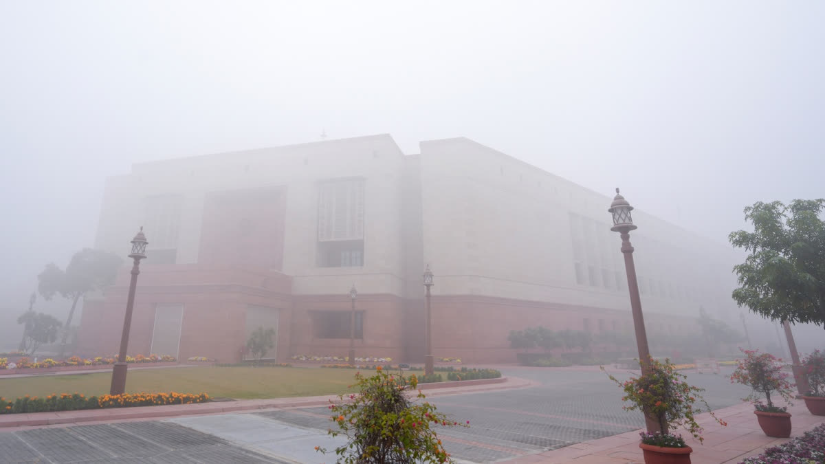 A view of the new Parliament building shrouded in dense fog on a cold winter morning, in New Delhi, Monday, Dec. 15, 2025.