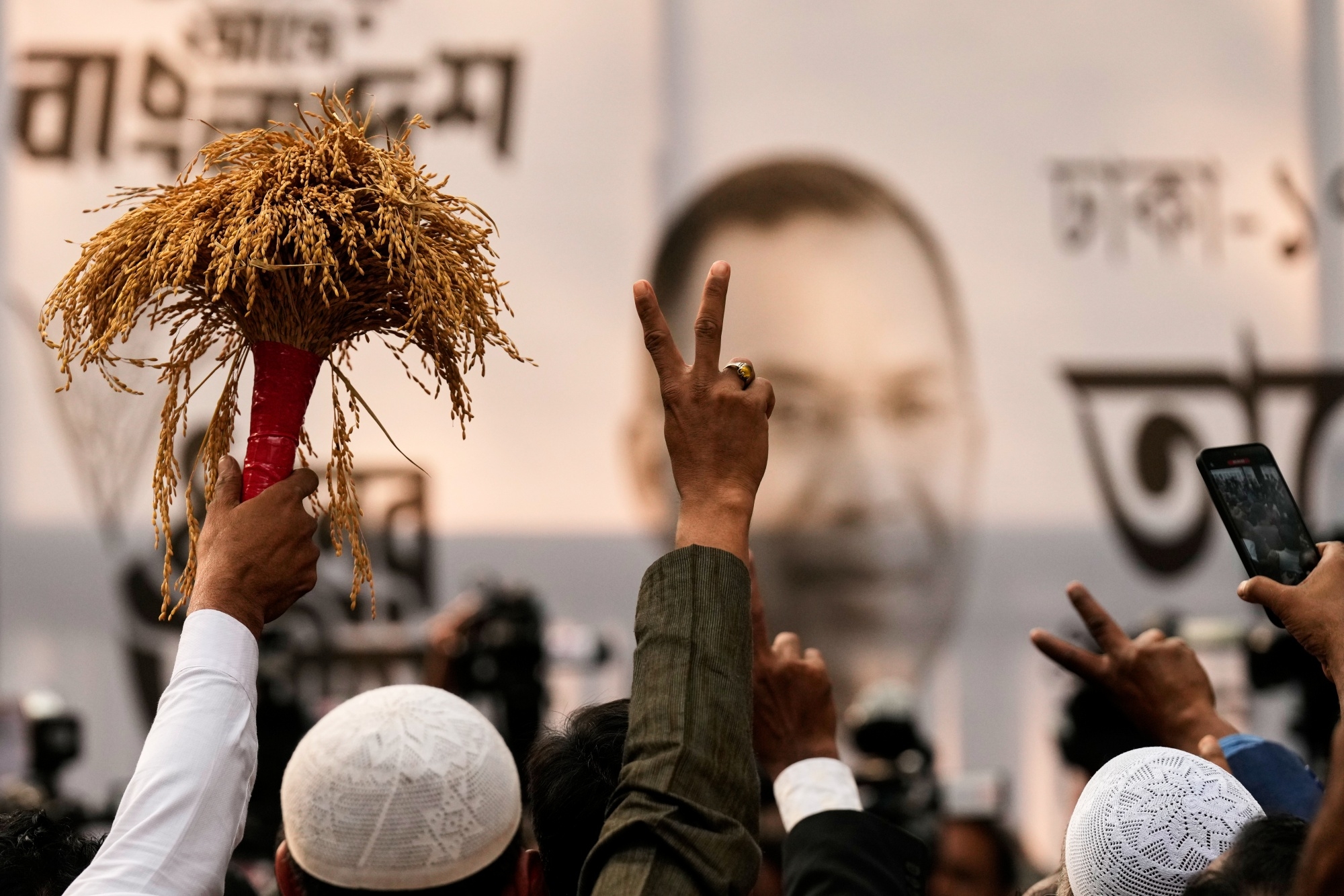Supporters cheer near the chairman office of the Bangladesh Nationalist Party (BNP) a day after the national parliamentary election in Dhaka, Bangladesh, Friday, Feb. 13, 2026