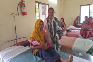 Woman Gives Birth Among Rocks While Being Taken To Ambulance In Gujarat Village Cut Off By Railway Line