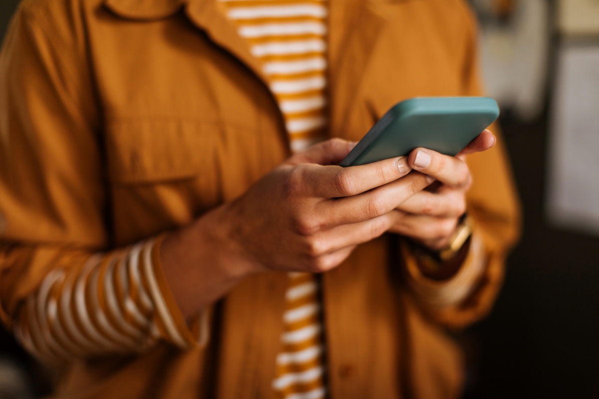 Person checking mobile phone