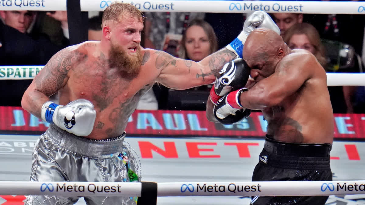 Jake Paul Vs Mike Tyson: YouTuber Turned Boxer Beats 'Iron Mike' As Hits Don't Match The Hype Jake Paul hits Mike Tyson during their heavyweight boxing match, Friday, Nov. 15, 2024, in Arlington, Texas.