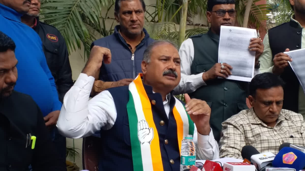 Rafeek Khan speaking to the media