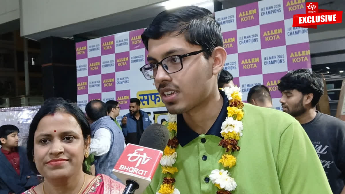 Topper Chiranjib with his mother