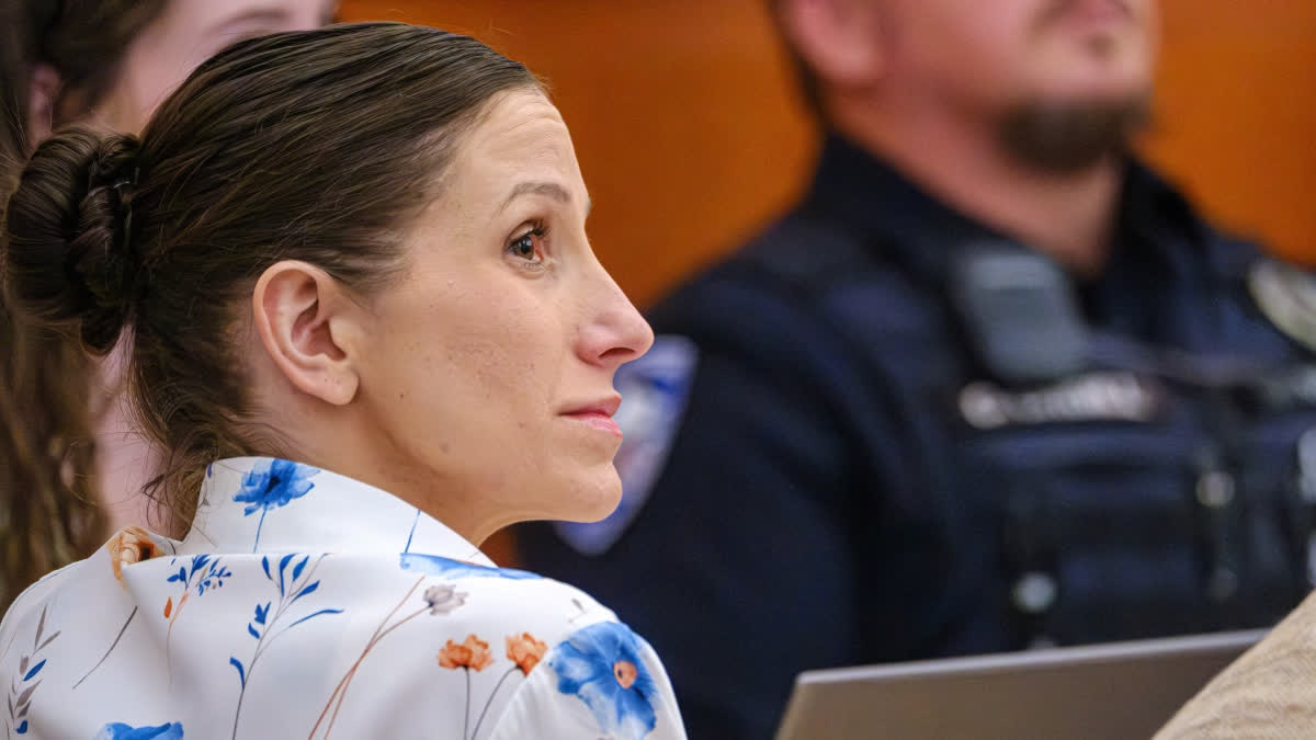 Defendant Kouri Richins, left, accused of poisoning her husband in March 2022, listens to closing arguments in Third District Court, Monday, March 16, 2026, in Park City, Utah.