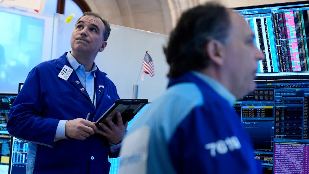 Christopher Lagana works on the floor at the New York Stock Exchange in New York, Tuesday, March 10, 2026.