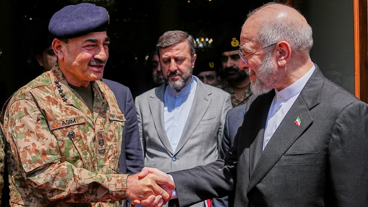 Iran's Parliamentary Speaker Mohammad Bagher Qalibaf, right, meets Pakistan's Army Chief Field Marshal Asim Munir in Tehran, Iran, Thursday, April 16, 2026.