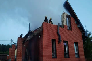 In this handout photograph posted on the official Telegram channel of Moscow Region Governor Andrey Vorobyov on May 17, 2026, Russian rescuers work in a heavily damaged house following an air attack at an undisclosed location in the Moscow region, amid the ongoing Russian-Ukrainian conflict.