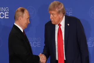 FILE - President Donald Trump, right, shakes the hand of Russia's President Vladimir Putin during a joint press conference at Joint Base Elmendorf-Richardson, Alaska, Aug. 15, 2025.