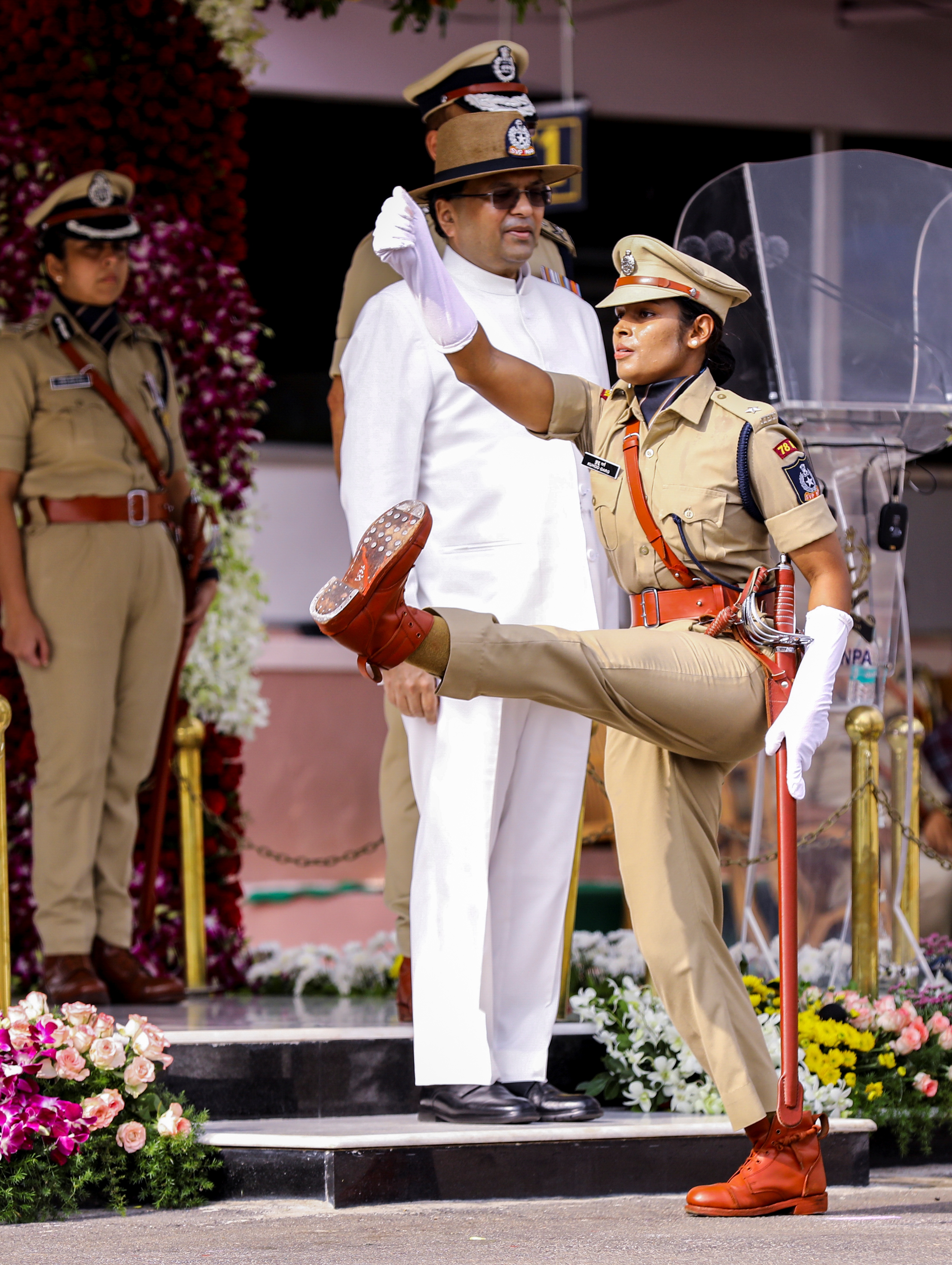 Home Secretary Govind Mohan presents the IPS Association Sword of Honour to Kuhoo Garg (Probationer IPS)