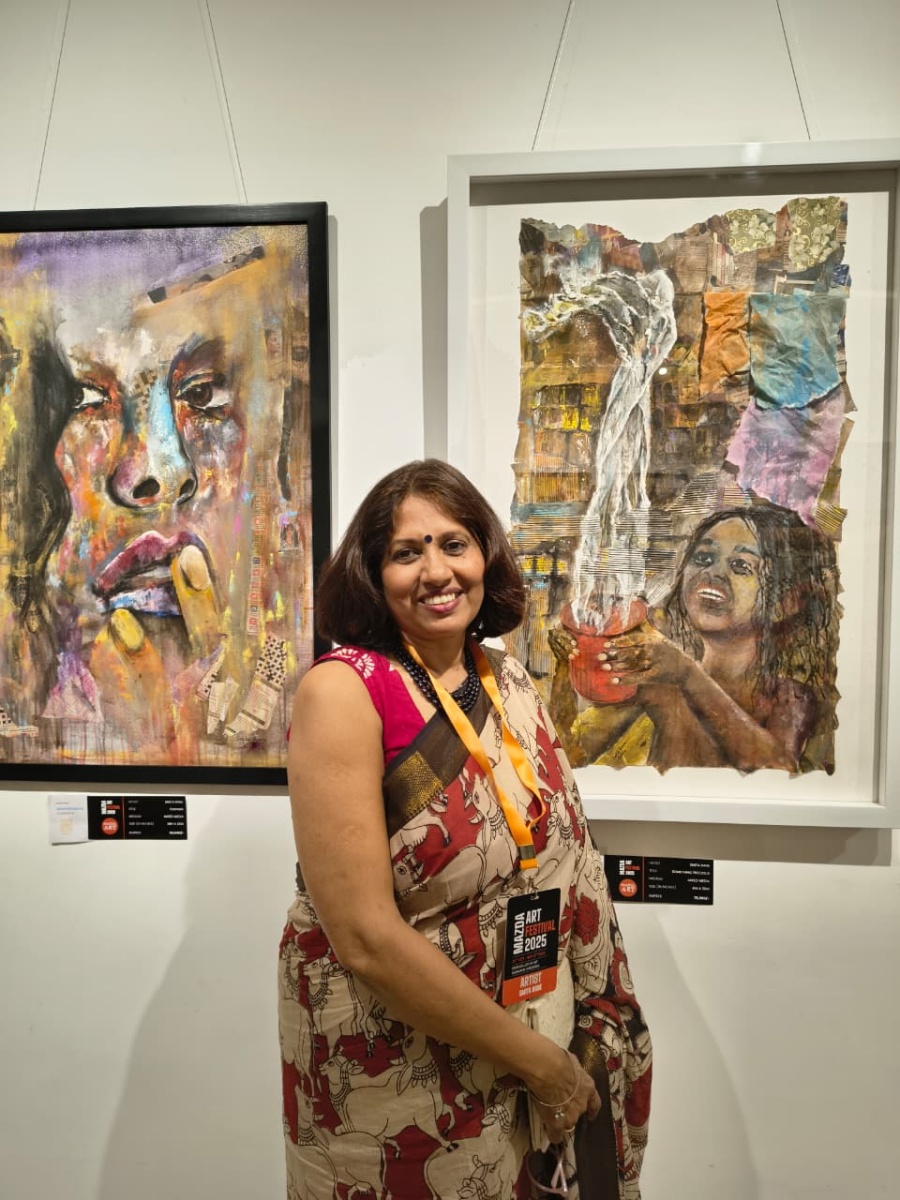 US-based artist Smita Rane poses with her works