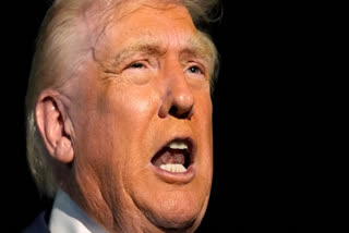 President Donald Trump speaks to reporters before boarding Air Force One at Palm Beach International Airport in West Palm Beach Fla., on his way back to the White House, Sunday, Nov. 16, 2025.