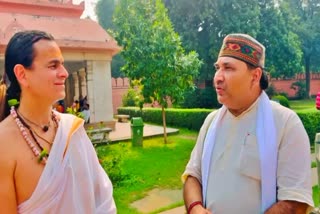 Student (left) and Dr. Saroj Pandey (right)