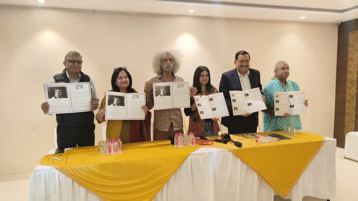 Makarand Deshpande and others launching Jayarangam brochure