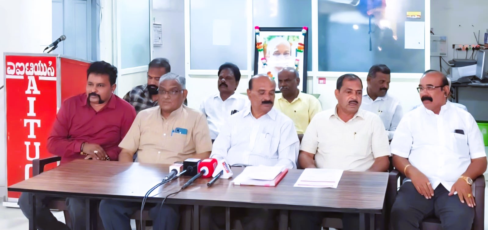 AITUC members at a press conference in Bengaluru on Wednesday.