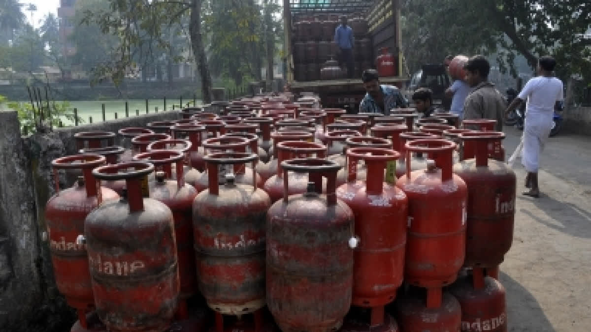 LPG cylinders being loaded in a load carrier in Haryana